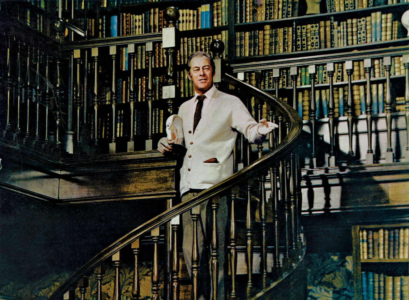 Rex Harrison playing the character of Henry Higgins from My Fair Lady